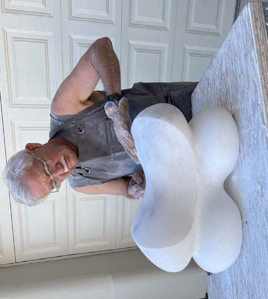 John Clark working on a sculpture in the workshop